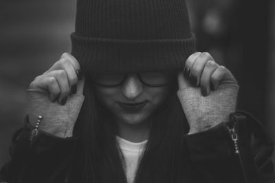 Close-up of young woman wearing warm clothing