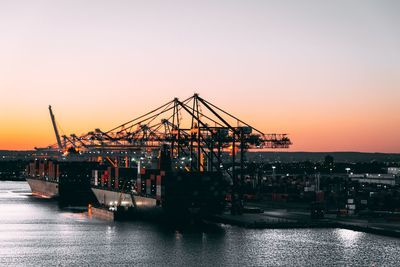 Scenic view of sea against clear sky during sunset