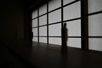 Shadow of people on wall