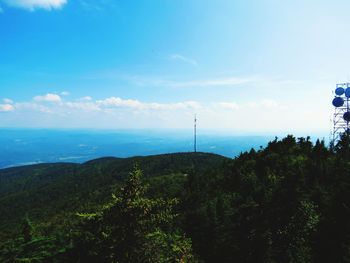 Scenic view of sea against blue sky