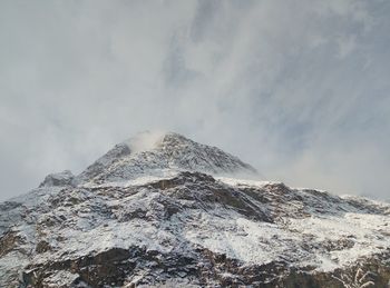 A snowy mountain. beautiful view of a mountain in a village in winters