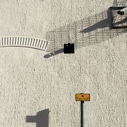 Road sign against sky