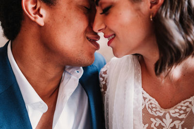 Close-up of young couple kissing