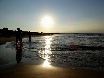 Scenic view of sea at sunset