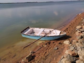 High angle view of abandoned boat moored on shore