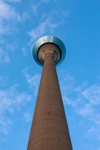 View from below on the rhine tower in düsseldorf, germany.