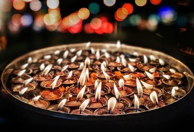 High angle view of burning candles