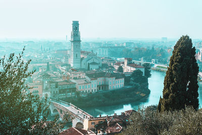 Blue hours in verona centre, italy. panoramic view from above on adige river and ponte pietra bridge