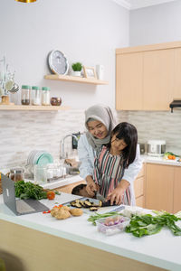 Woman preparing food at home