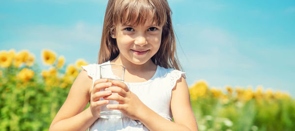 Young woman drinking water