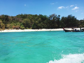 Scenic view of sea against blue sky