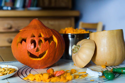 Carved pumpkin on table