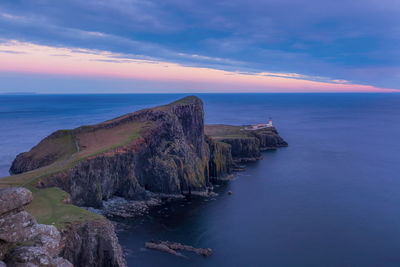 Scenic view of sea against sky at sunset