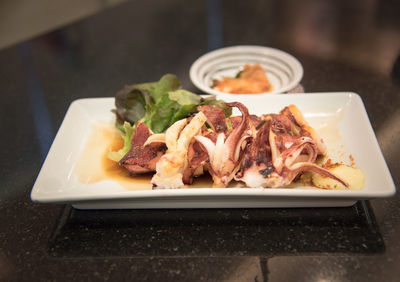 Close-up of food served in plate on table