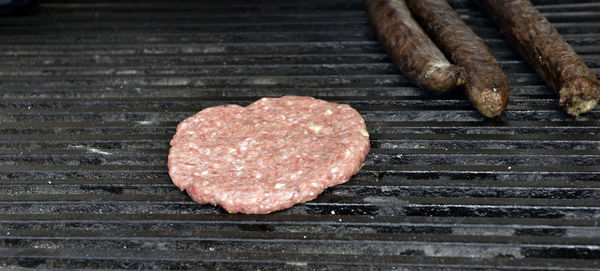 Close-up of meat on barbecue grill