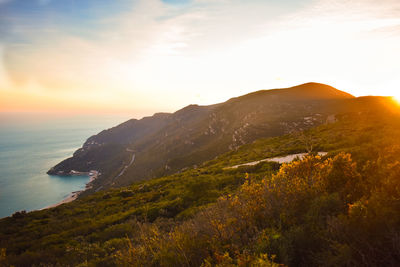 Scenic view of sea against sky during sunset