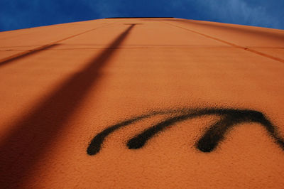 Close-up of shadow on sand