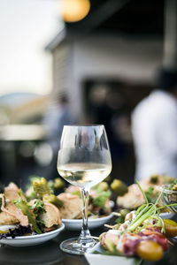 Close-up of wineglass on table in restaurant