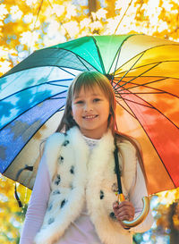 Portrait of woman with umbrella