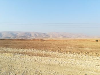 Scenic view of desert against sky