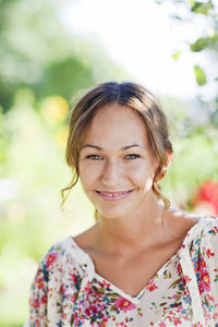 Portrait of young woman smiling