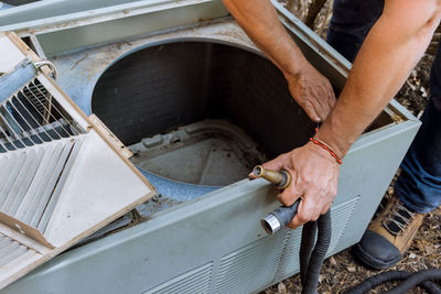 Low section of man working