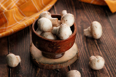 High angle view of mushrooms in bowl on table