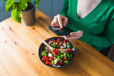 High angle view of woman preparing food