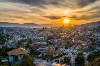 High angle view of townscape against sky during sunset