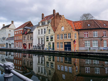 Buildings in city against sky