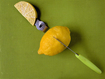 Close-up of fruit over white background