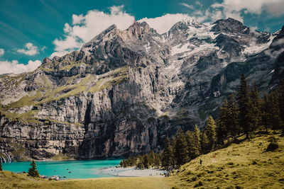 Scenic view of landscape and mountains against sky