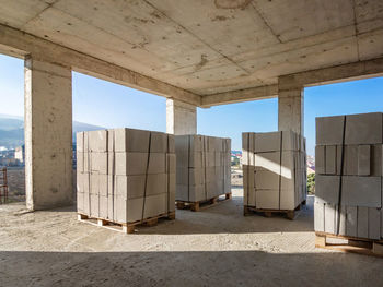 Corridor of building against sky