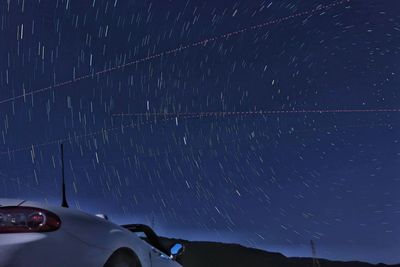 Scenic view of star field against sky at night