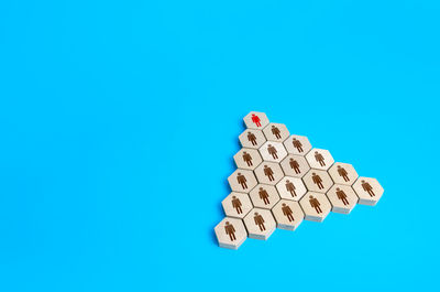 Close-up of dices against blue background