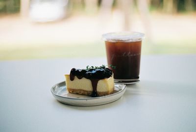 Close-up of coffee served on table