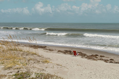 Scenic view of beach against sky