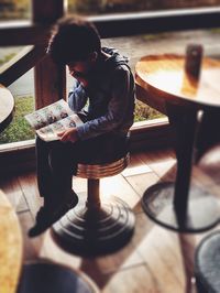 Young woman standing on white background