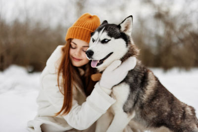 Close-up of dog on snow