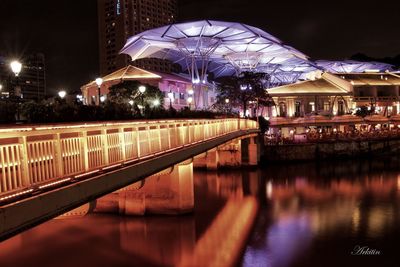 Reflection of illuminated buildings in water