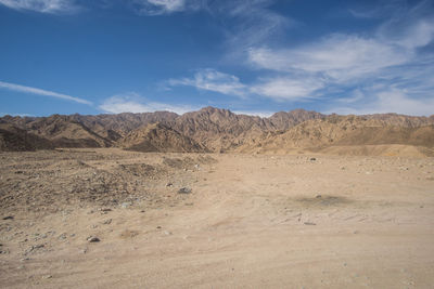 Scenic view of desert against sky