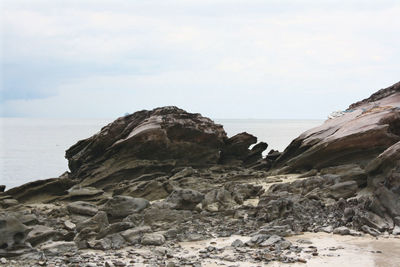 Scenic view of sea and cliff