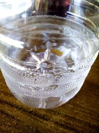 Close-up of beer glass on table