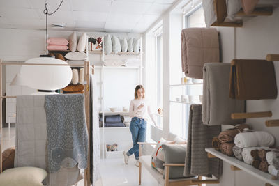 Woman standing at home