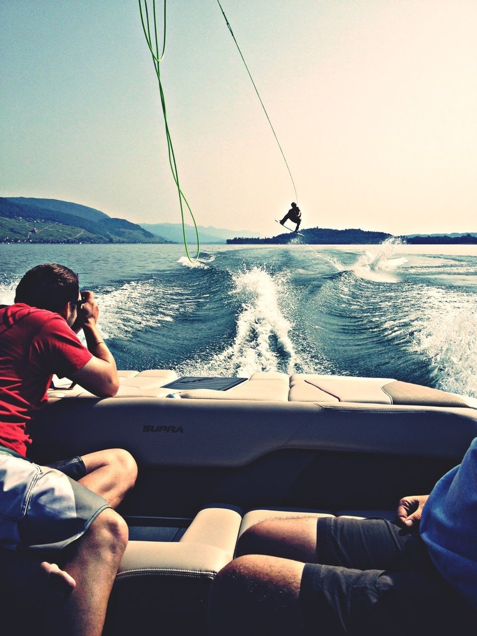 transportation, water, sea, mode of transport, nautical vessel, clear sky, boat, lifestyles, leisure activity, horizon over water, part of, men, travel, cropped, holding, scenics, sitting, vacations