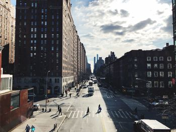 City street amidst buildings against sky