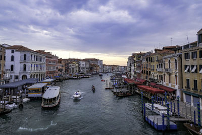 View of the grand canal from rialto bridge - classic beautiful view with boats and gondolas - venice
