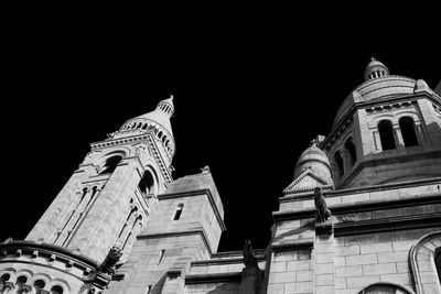 Low angle view of temple against clear sky at night