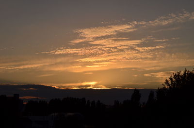 Scenic view of dramatic sky during sunset