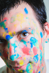 Close-up portrait of boy wearing mask